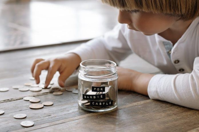 Should you save for your children’s future or focus on paying off debt first